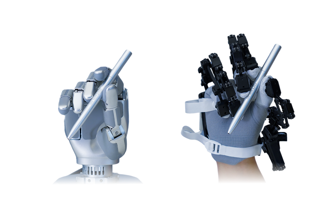 Robotic hand holding a pen